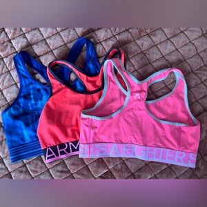 Under Armour Blue, Orange, and Pink Sports Bras